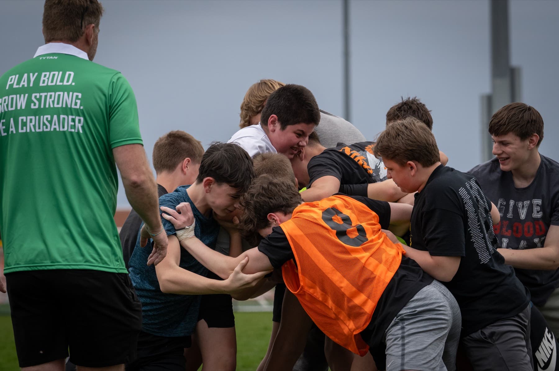 Young Fortivus players binding together during training