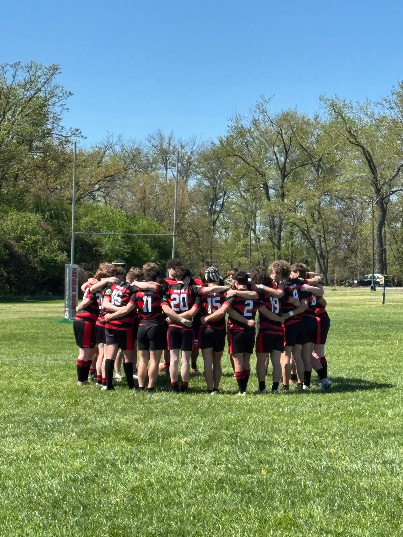 Warriors rugby players on the field
